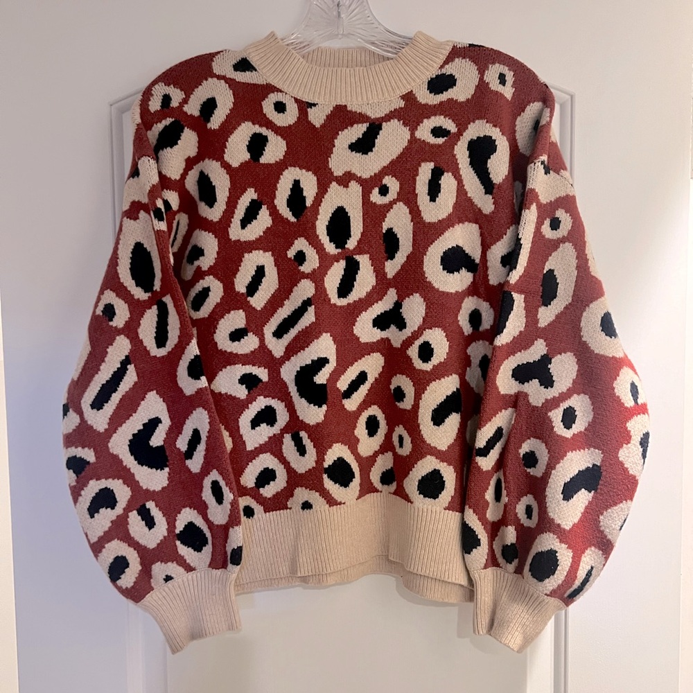 The Mint sweater 
Bell sleeve 
Mocked neck
